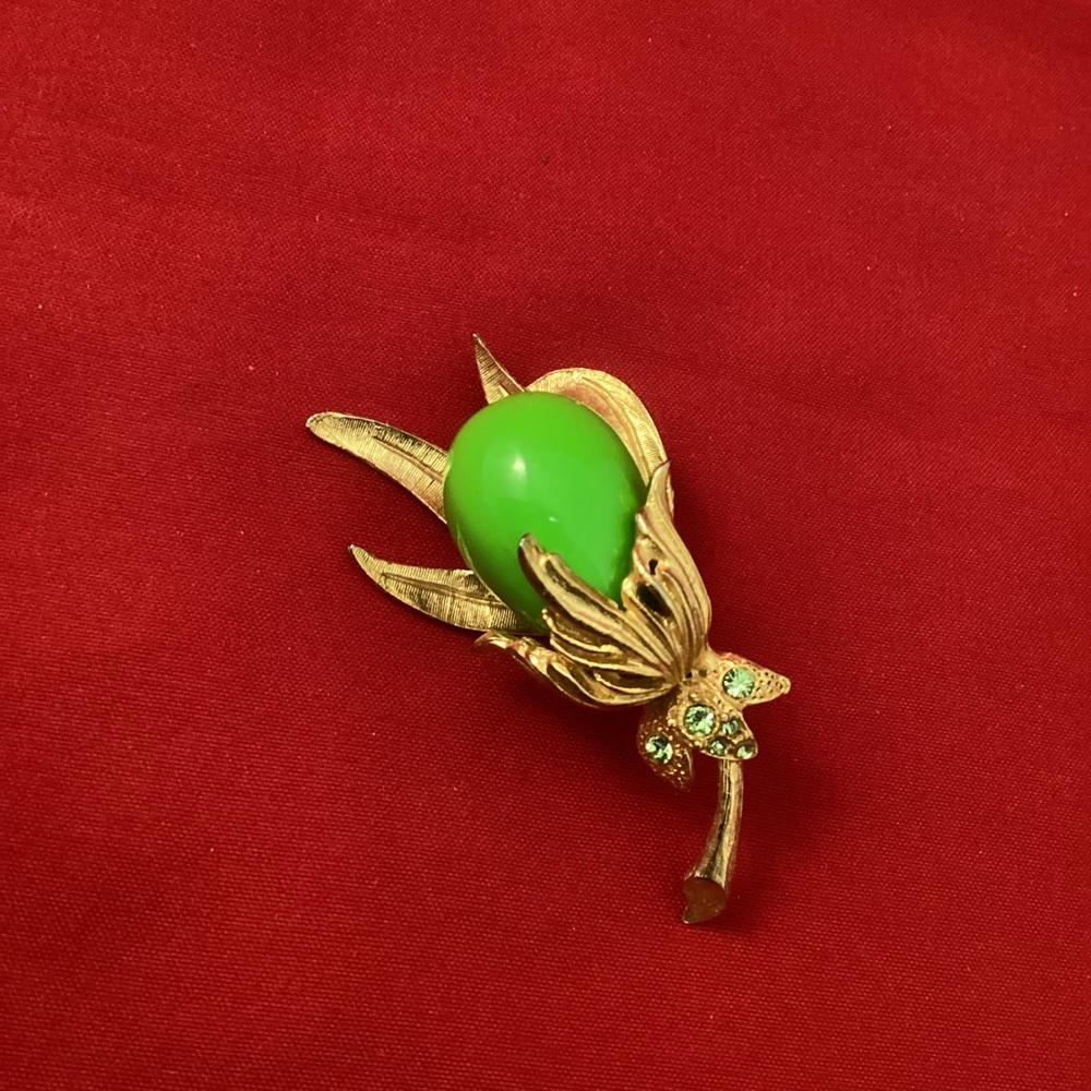 Hattie Carnegie signed gold tone and green floral brooch
